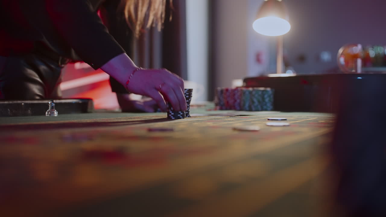 Person Playing Roulette at a Casino
