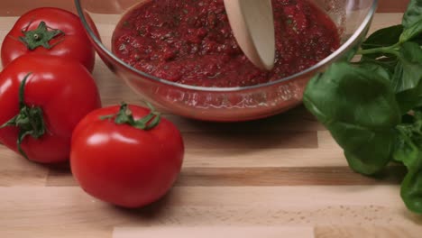 making homemade tomato sauce with basil