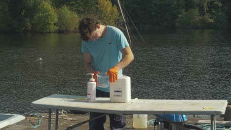 dispensing epoxy into plastic tub boat building project