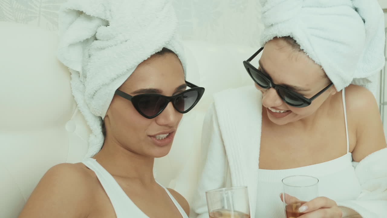 Two Women Relaxing with Champagne at a Spa