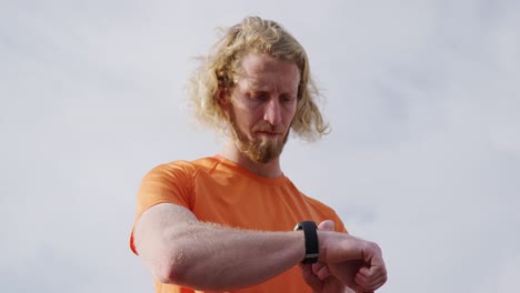 sporty caucasian man on a bridge