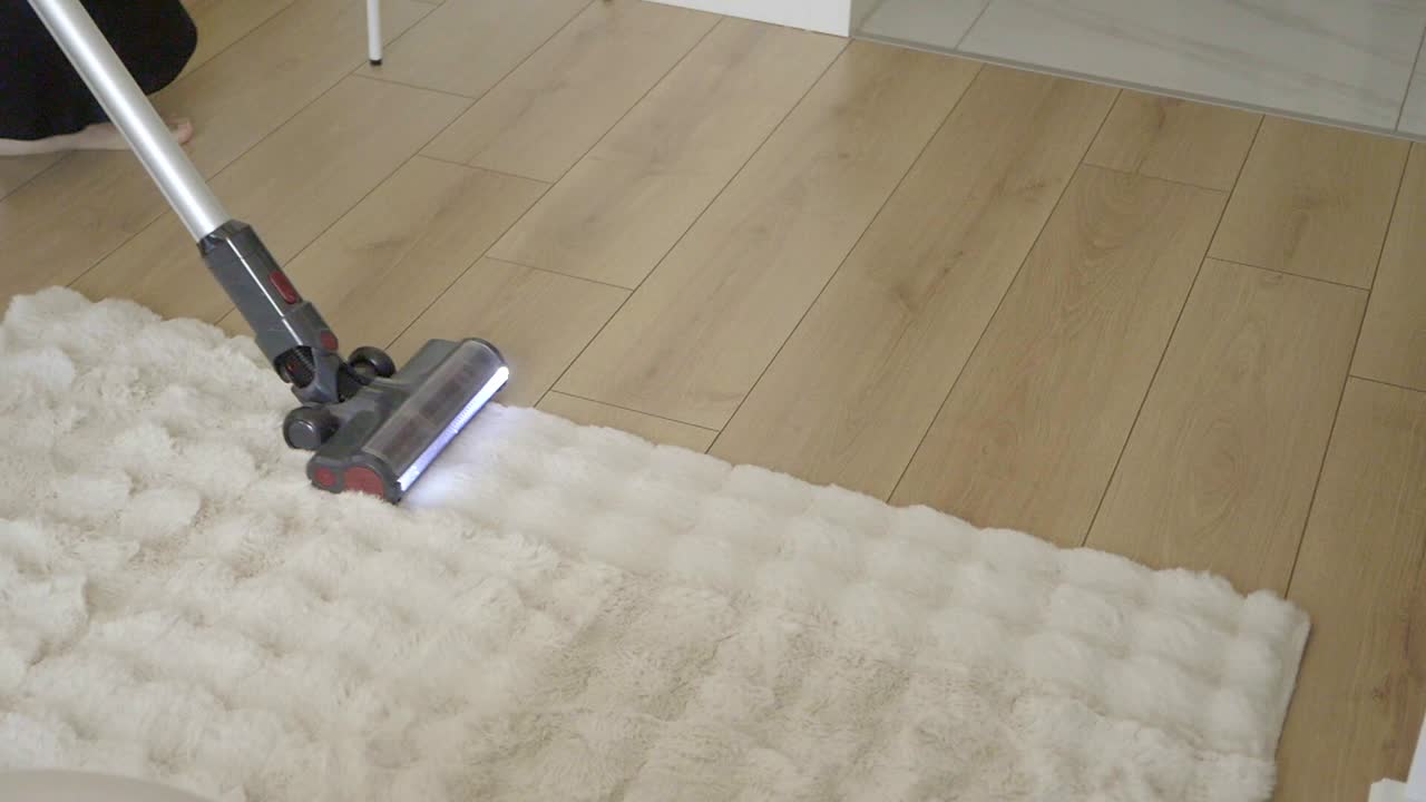 Vacuuming a carpet