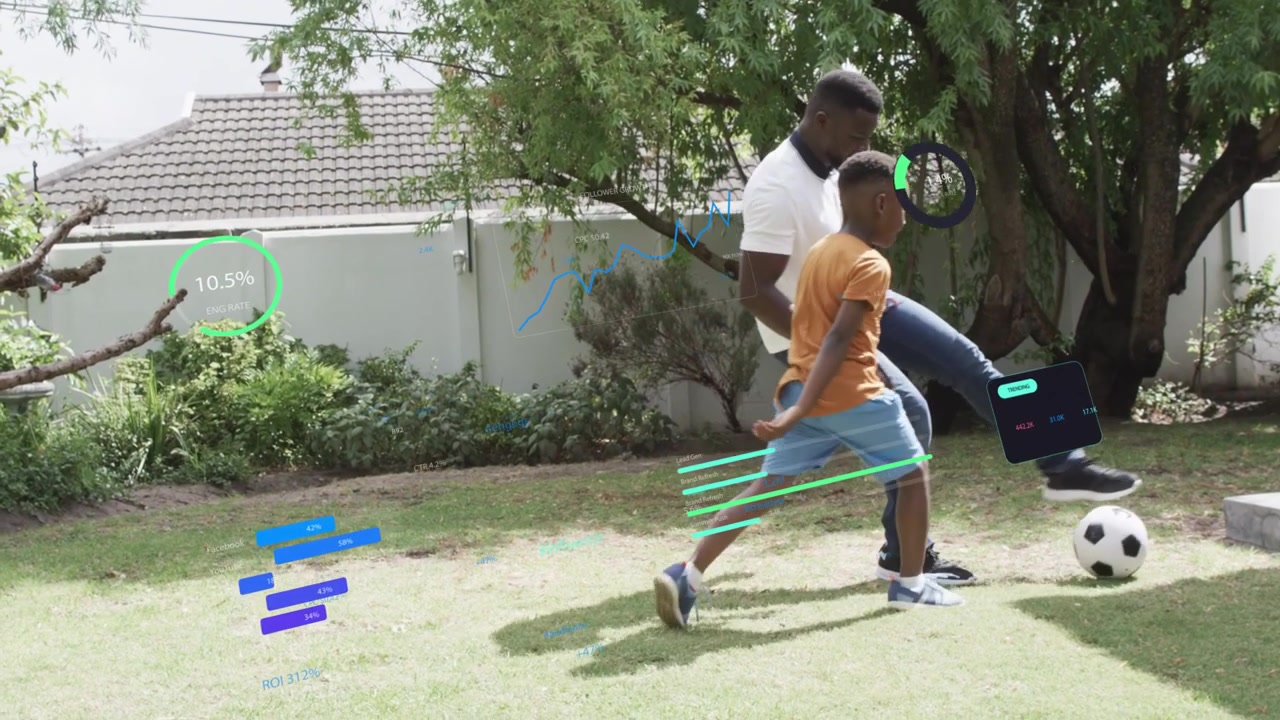Boy pushing soccer ball forward, man closing to challenge, HUD graphs tracking training in sports