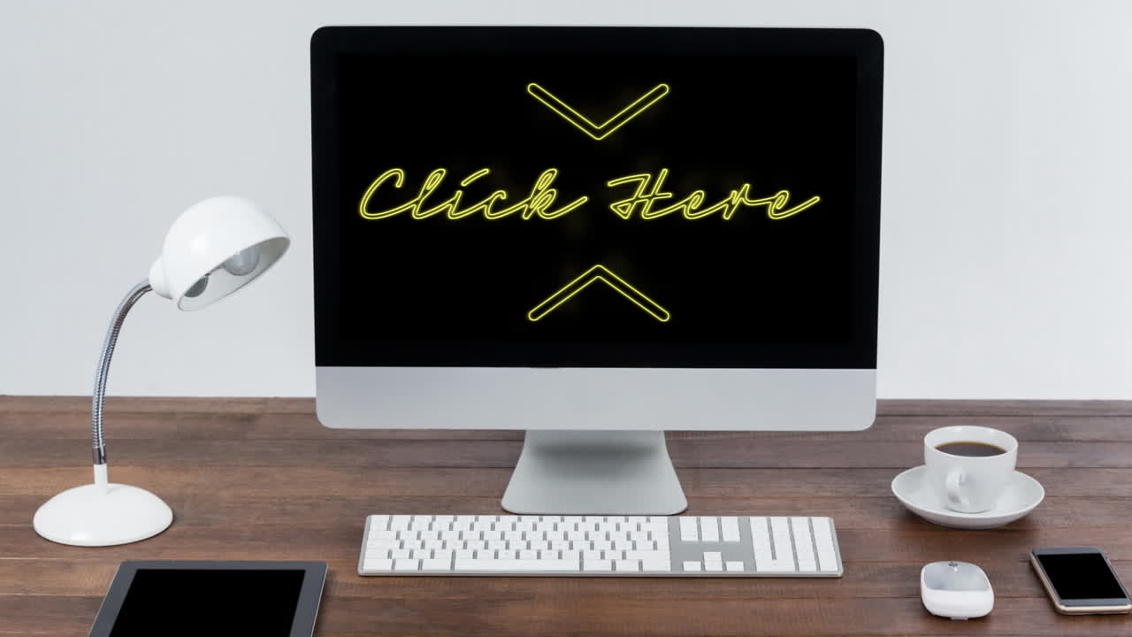 책상 위에 서 있는 데스크 ⁇  컴퓨터의 화면에서  ⁇ 박이는 단어의 애니메이션을 클릭하십시오.