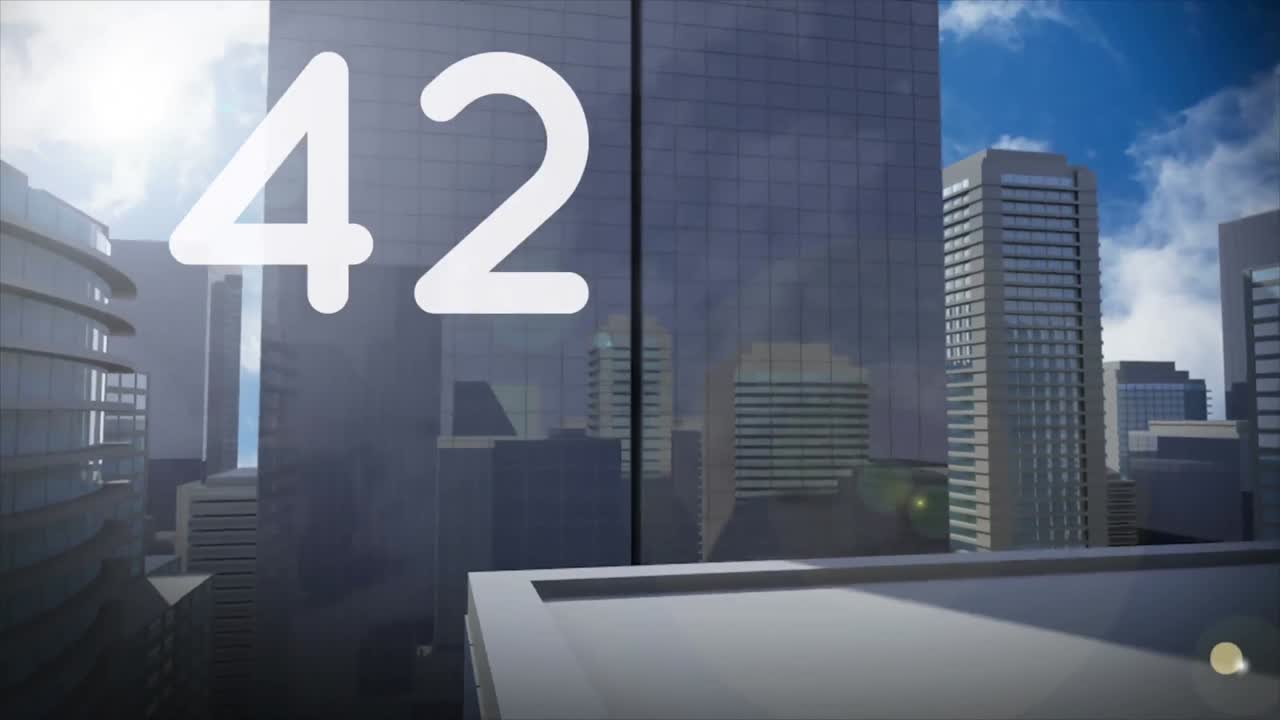 composición digital de números crecientes contra edificios altos en el fondo