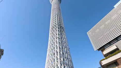 walking towards tokyo tower, urban surroundings