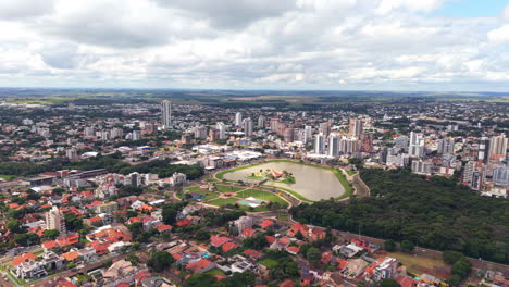 panorama aerial view of toledo cityscape with dense urbanization and central park through a sprawling skyline, paraná, brazil.