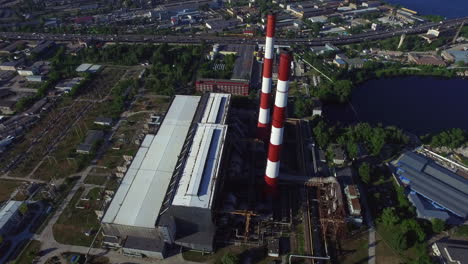 Industrial-chimney-power-plant-in-modern-city.-Drone-view-pipe-water-power-plant