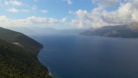 Overview-of-Ionean-sea-surrounded-by-mountain-landscape-in-summer