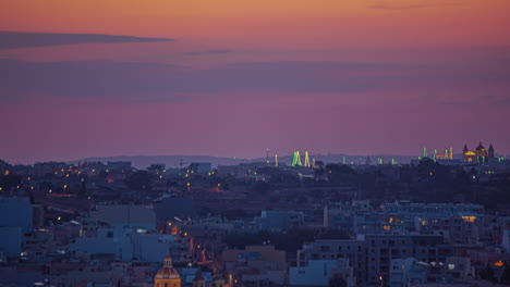 Timelapse-shot-of-sun-rising-over-beautiful-seaside-town-in-Marsaxlokk-in-Malta-at-dawn