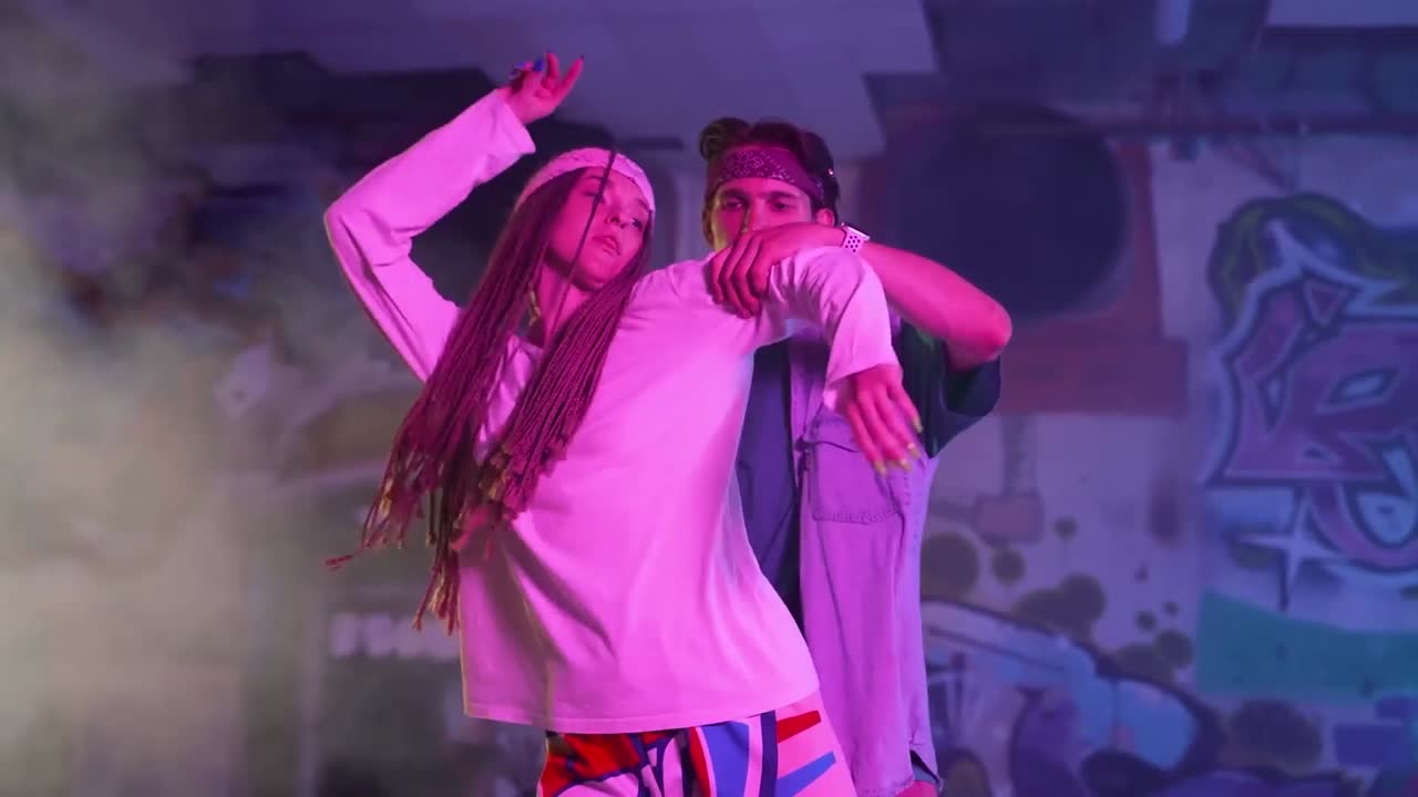 People Dancing in Urban Setting