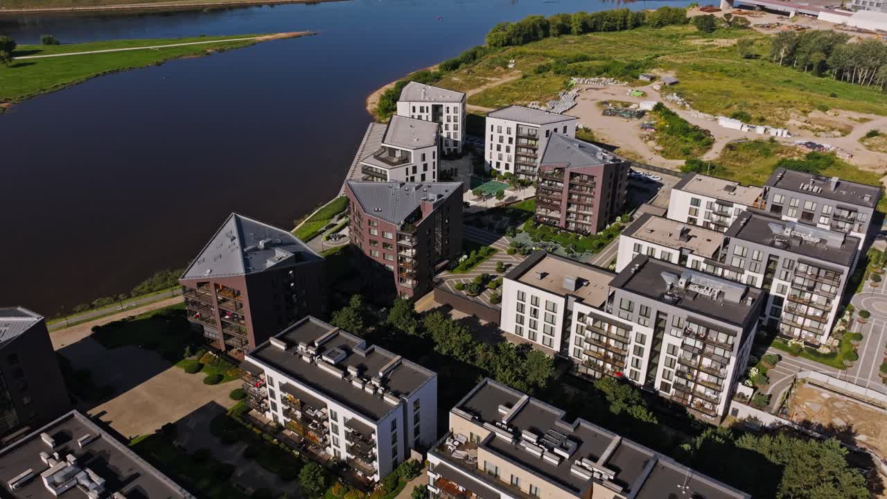 Modern Kaunas architecture near river highlights cultural and strategic role
