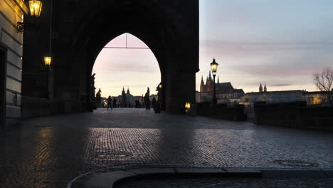 silhouette of arch gate to chrles bridge, prague czech republic