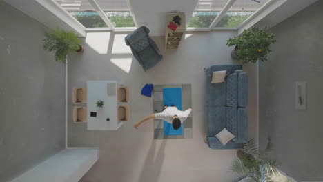 man exercising on mat in living room