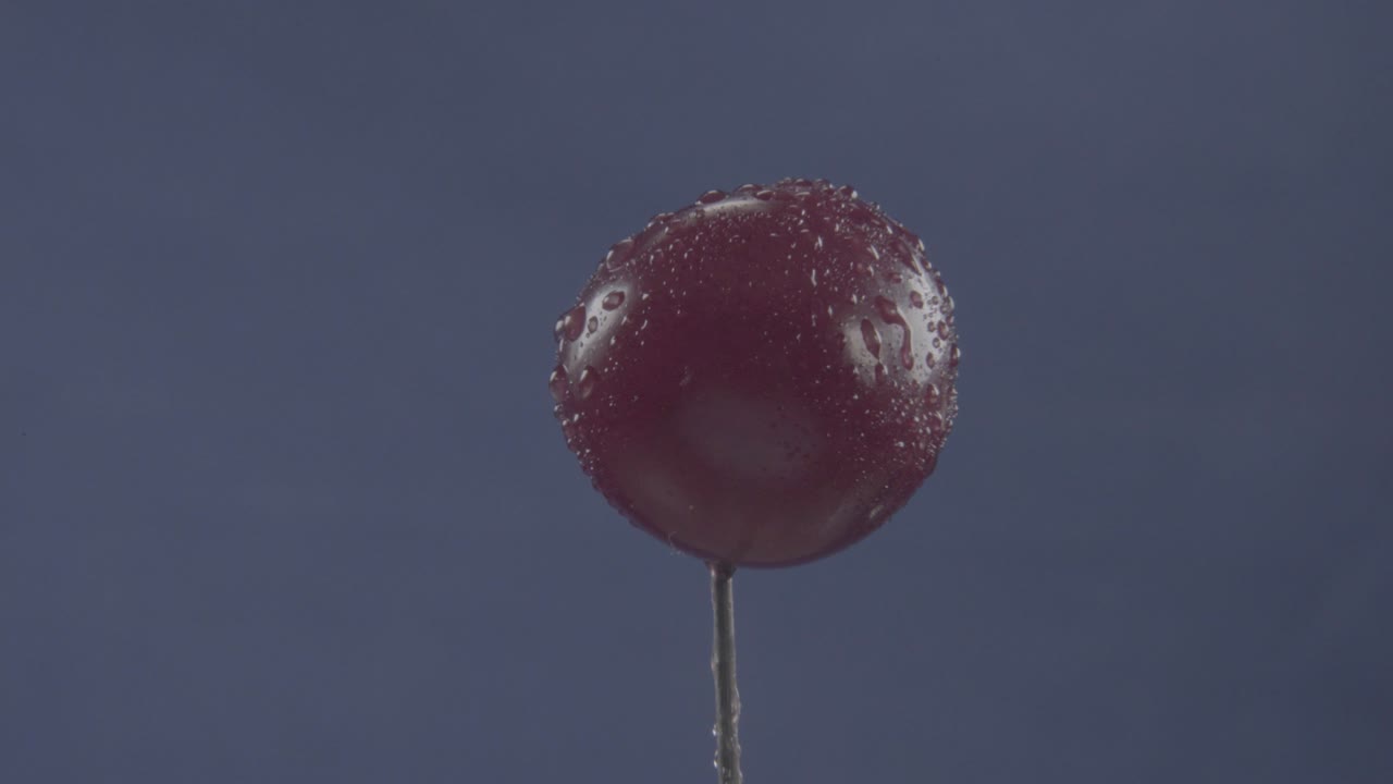 Cherry rotating with loop on blue screen for chroma key