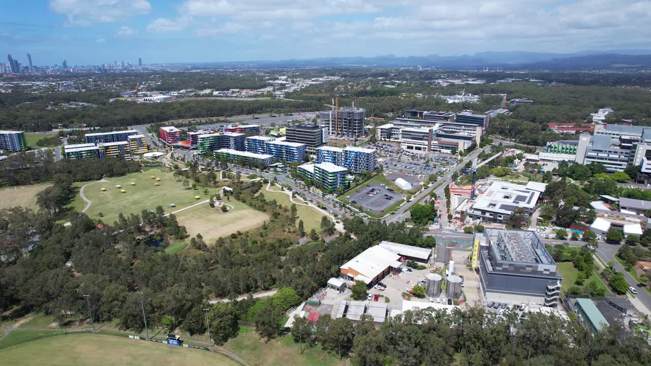 Aerial View of a Modern Cityscape with Parks and High-Rise Buildings
