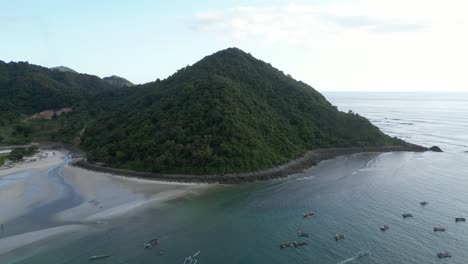 A-small-hill-on-the-coastline-of-Lombok,-Indonesia-during-a-summers-afternoon