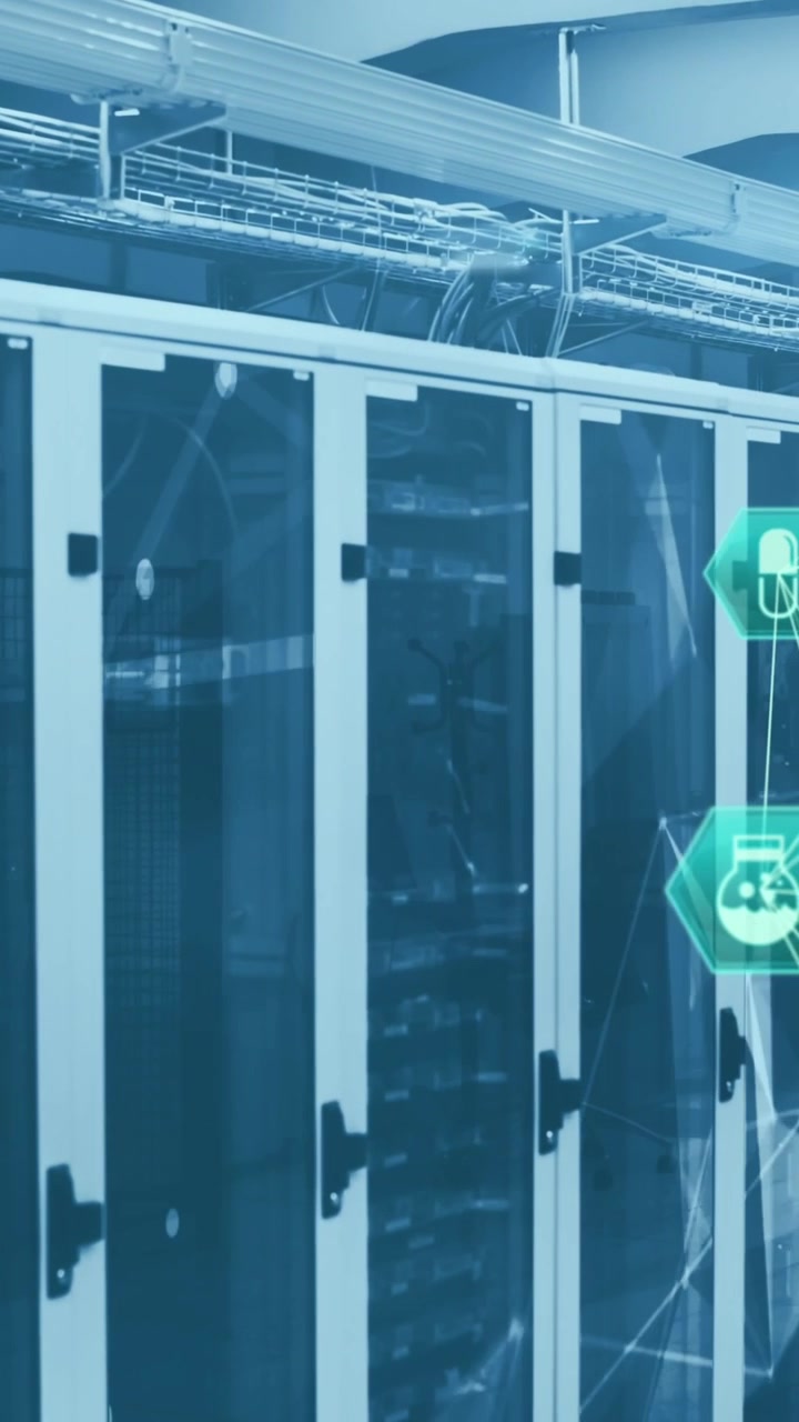 Animation of globes of medical icons spinning against computer server room