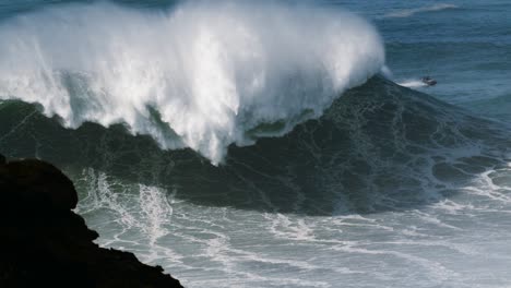 slow motion of a breaking wave in nazaré, portugal