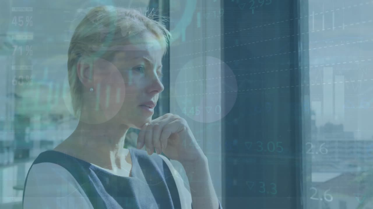 Animation of data processing over caucasian businesswoman in office