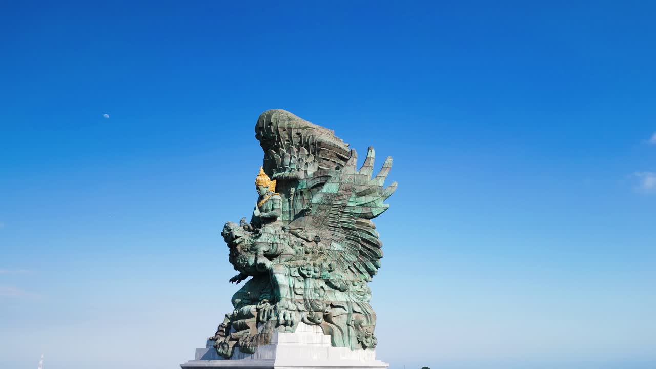 Aerial of Bali's Patung Garuda Wisnu Kencana, awe-inspiring statue that depicts the Hindu god Vishnu riding atop the mythical bird Garuda