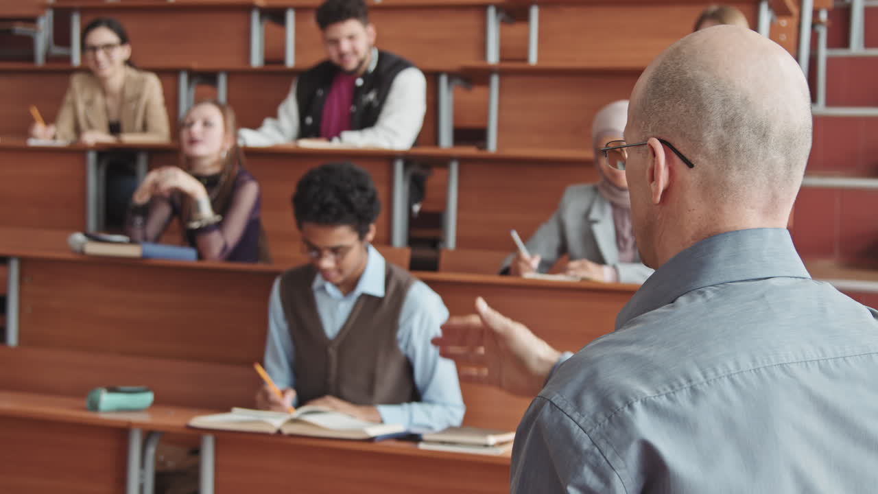 Confident Professor Talking to Students Giving Lecture