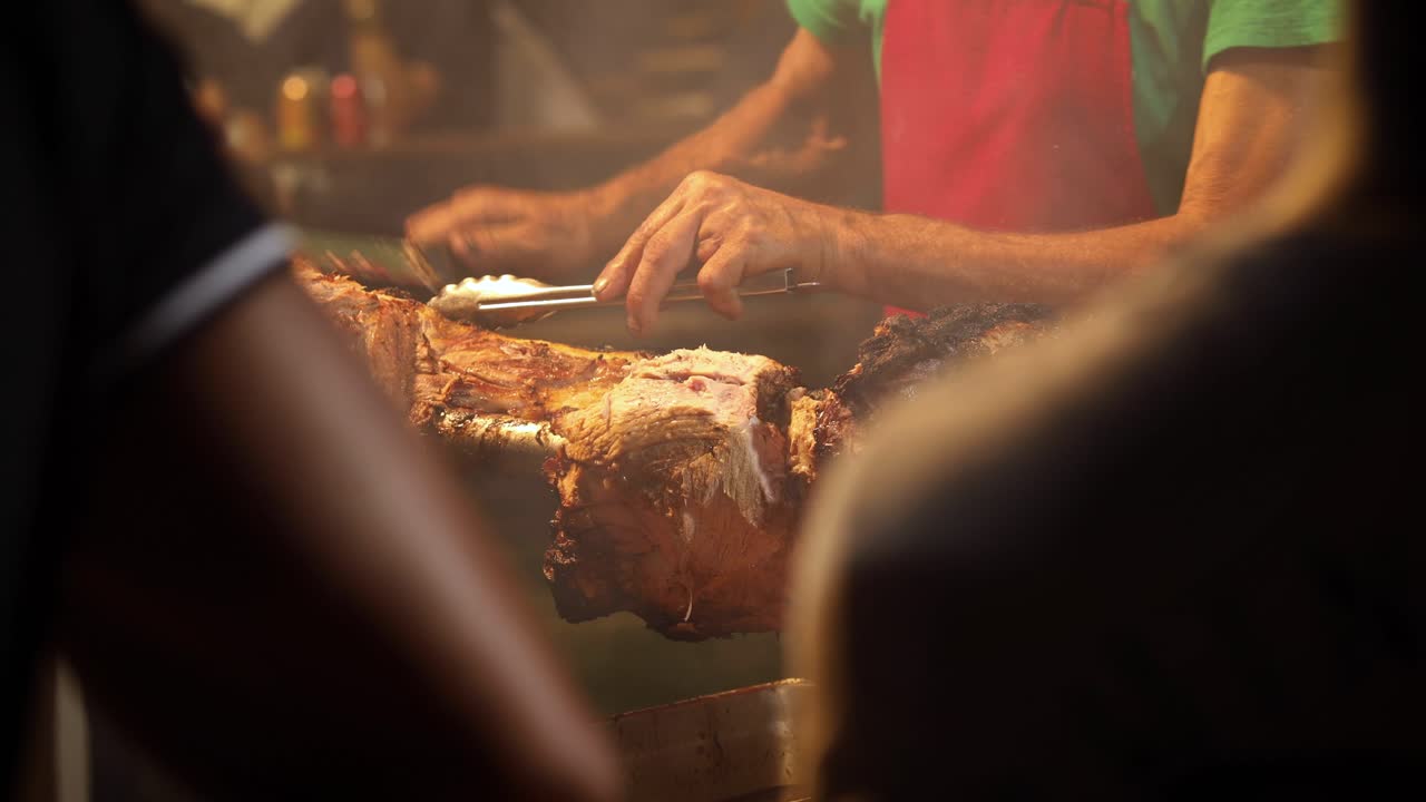 Street Food. Pork being cooked over hot charcoal fire