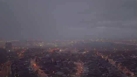 timelapse overlooking toronto, canada. fog and cloudy night.