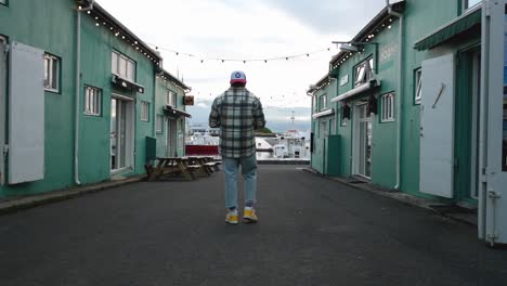 man at dawn marina of reykjavík port