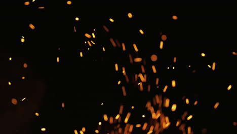 campfire sparks at night