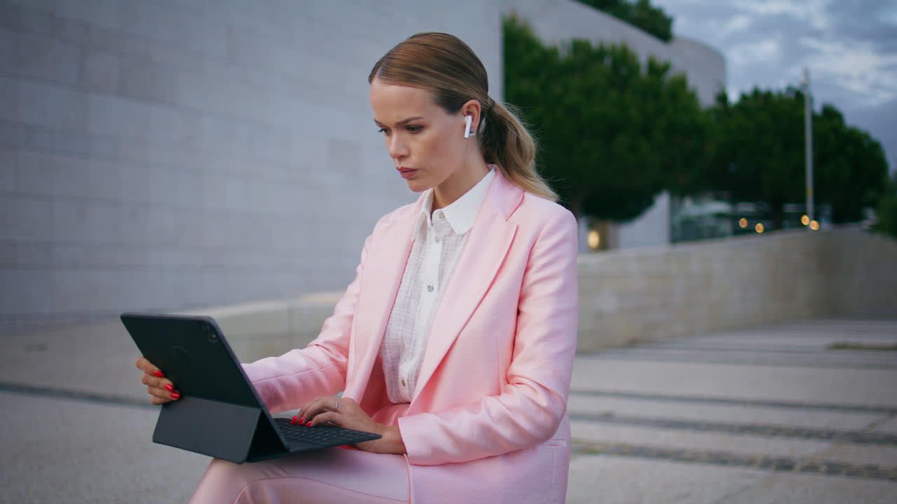 Worried freelancer working laptop sitting bench outdoors closeup. Business woman