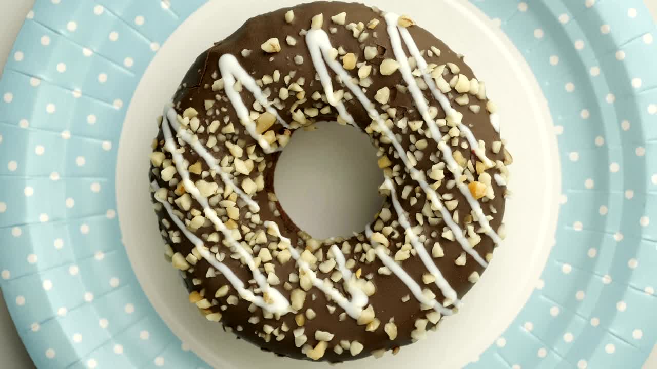 el donut está vidriado de cerca, con un bucle sin costuras.