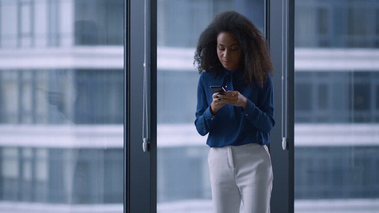 Cute african american businesswoman in modern office