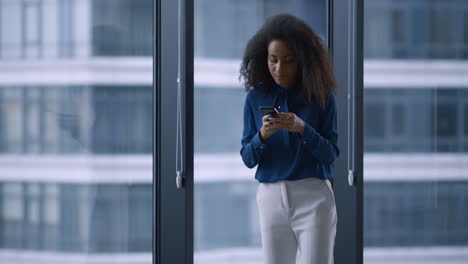 cute african american businesswoman in modern office