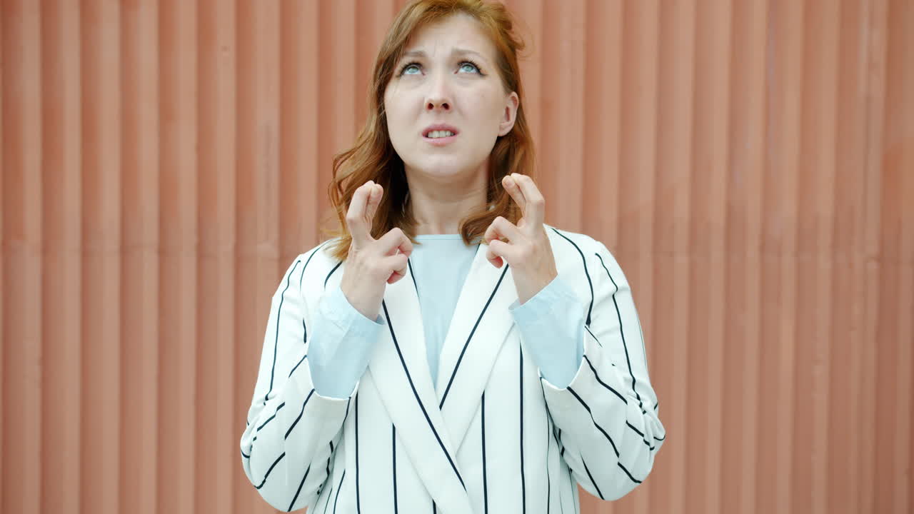 Woman Crossing Fingers