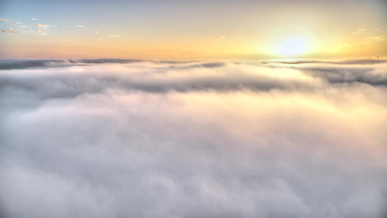 Aerial View of Dense Clouds at Sunset