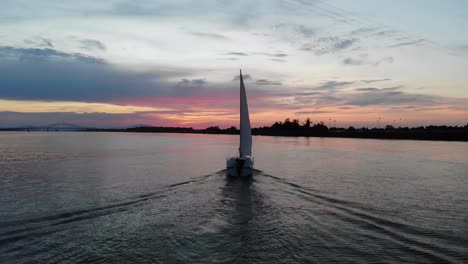 aerial tracking shot of a traditional sailing boat on the upper columbia river