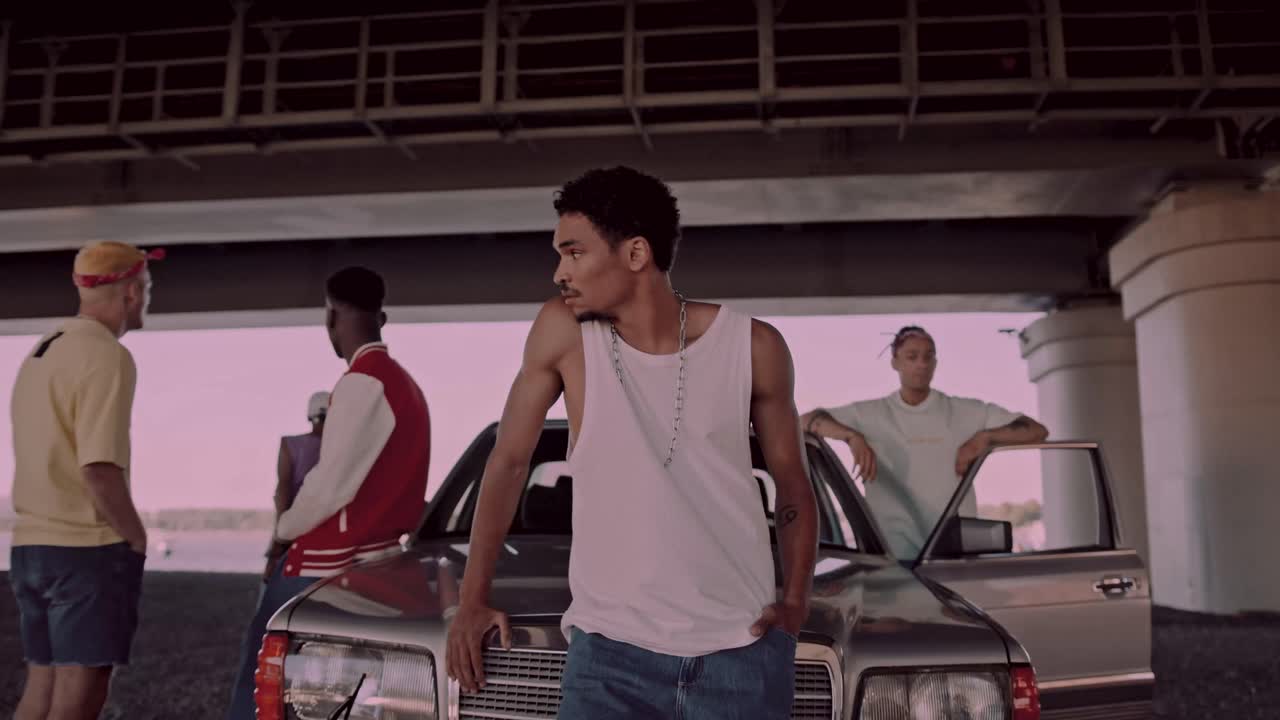 Urban fashion shoot with people and a car