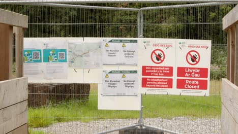 Path-closed-signs,-informing-people-of-felling-infected-trees-with-larch-disease-on-the-Rhyslyn-forest-road-in-the-Afan-Valley