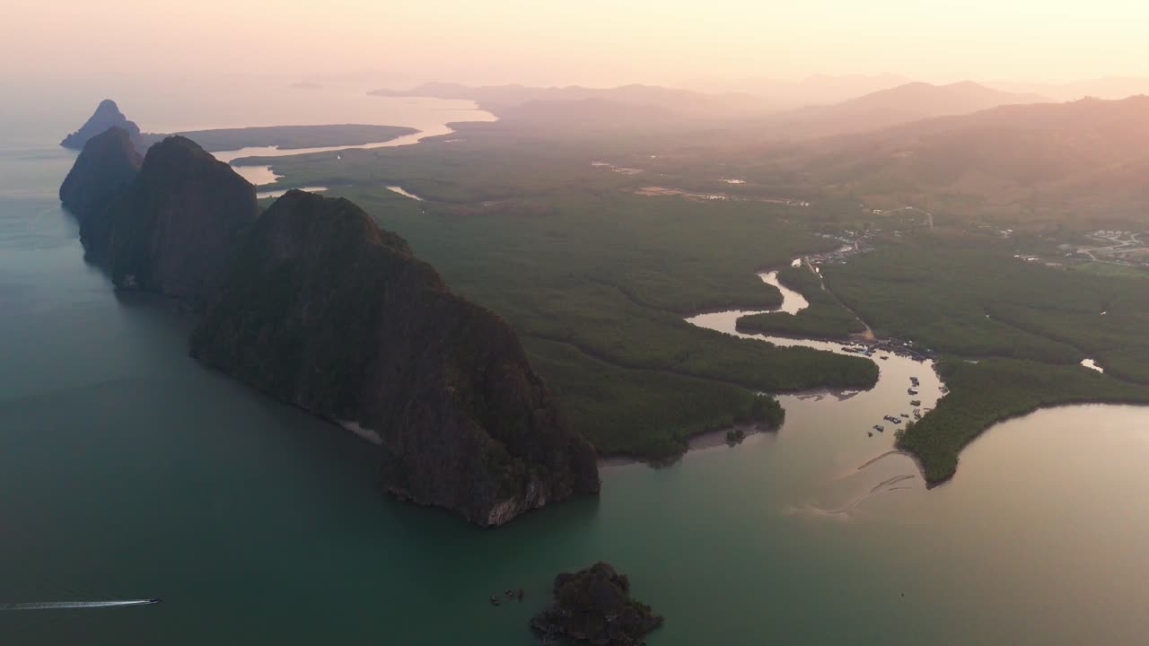 Serene aerial view of Phang Nga Bay, showcasing lush landscapes and mountain formations