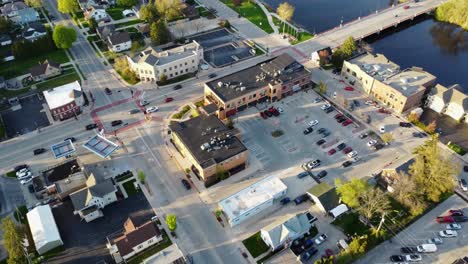 aerial flyover of a small suburban town in summer