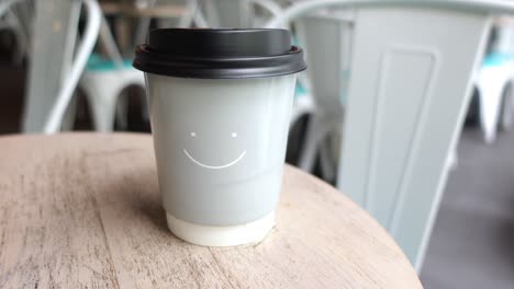 coffee cup on a table at an outdoor cafe