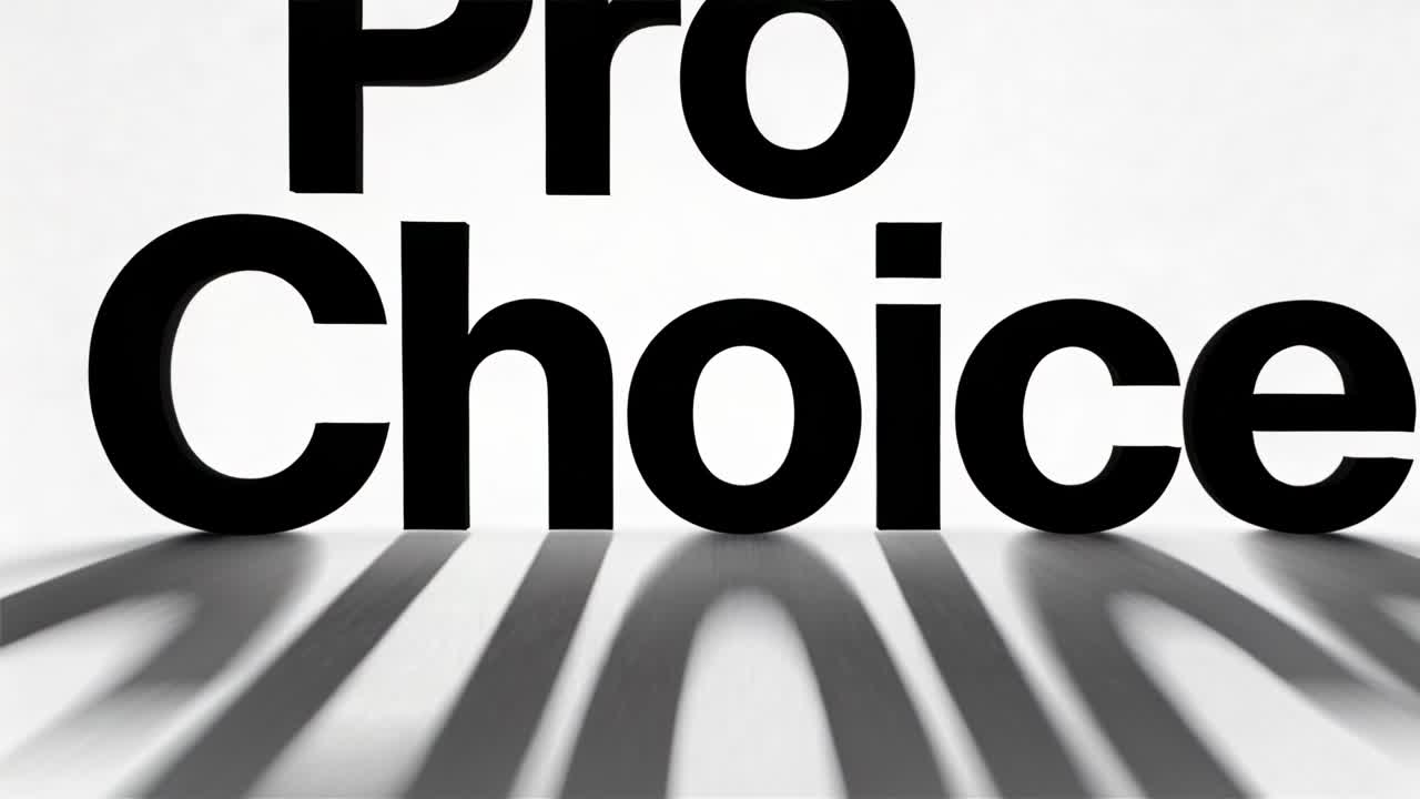 Animation starting, zooming shot showing black 3D Pro Choice letters on white surface, long shadows
