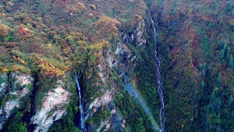 4k-60-fps-aerial-video-moving-through-Keystone-Canyon,-on-the-road-to-Valdez,-Alaska