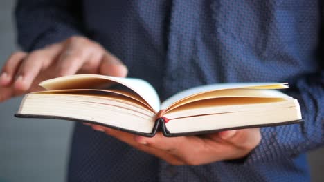 person holding an open book