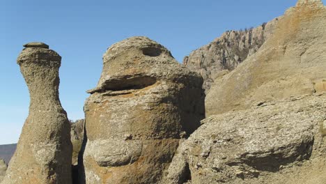 strange rock formations in a mountainous landscape