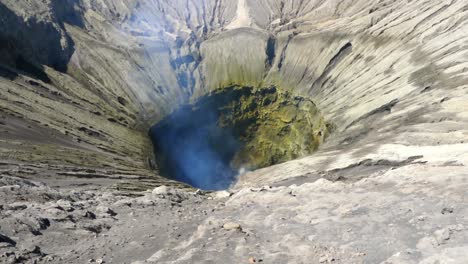 smoke rose from bromo crater the steaming active volcano, tengger semeru national park in east java, indonesia