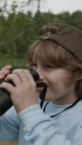 person using binoculars