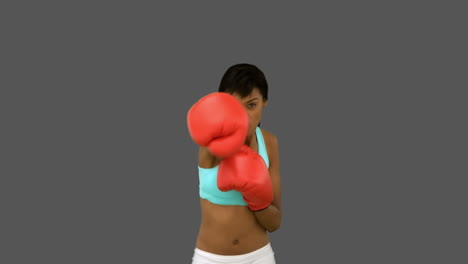 Gorgeous-woman-with-red-gloves-boxing