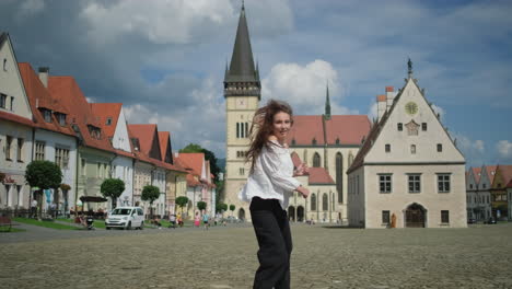 woman running in european town square